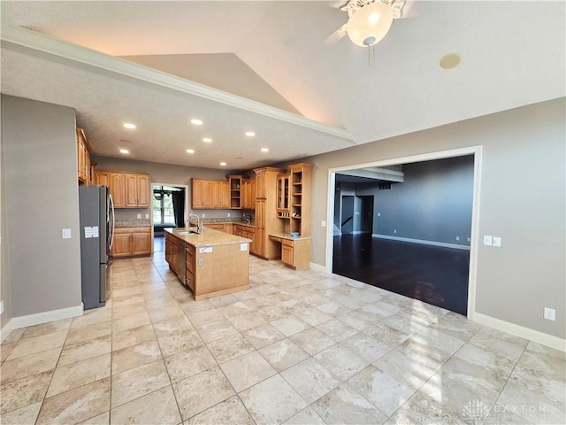 1962 Fountain View Dr, Dayton, OH 45414 - kitchen with freestanding refrigerator, open shelves, lofted ceiling, an island with sink, and a ceiling fan