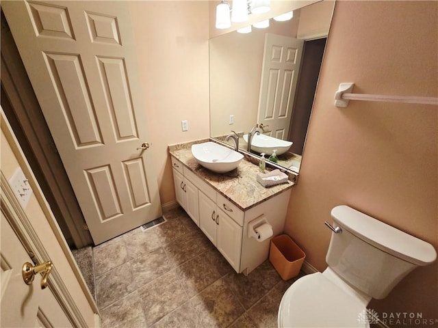1962 Fountain View Dr, Dayton, OH 45414 - bathroom featuring vanity and toilet