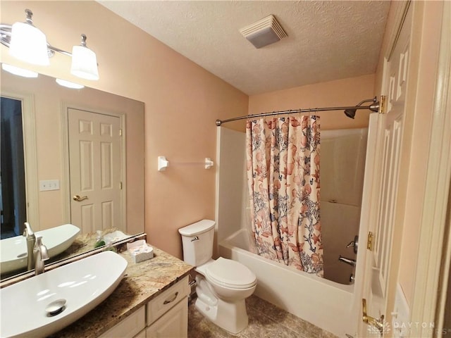1962 Fountain View Dr, Dayton, OH 45414 - bathroom featuring vanity, a textured ceiling, shower / bath combo with shower curtain, and tile patterned flooring