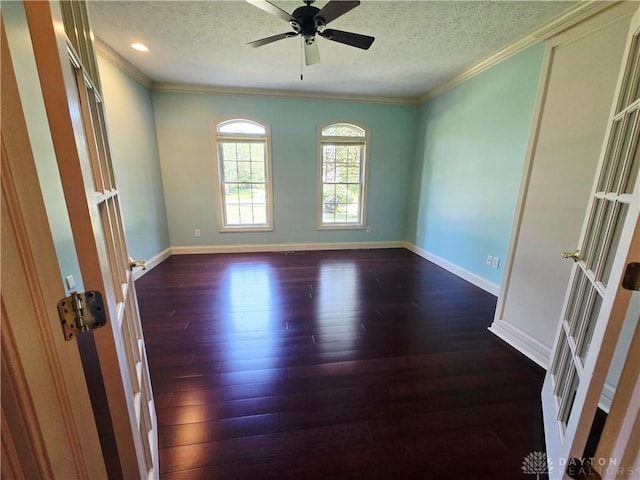 1962 Fountain View Dr, Dayton, OH 45414 - unfurnished room featuring crown molding, dark wood-style flooring, a textured ceiling, french doors, and a ceiling fan