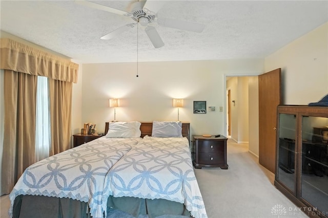 328 Shadywood Dr, Clayton, OH 45415 - bedroom featuring carpet flooring, a textured ceiling, and a ceiling fan
