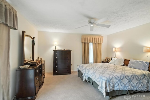 328 Shadywood Dr, Clayton, OH 45415 - bedroom with light carpet, ceiling fan, and a textured ceiling