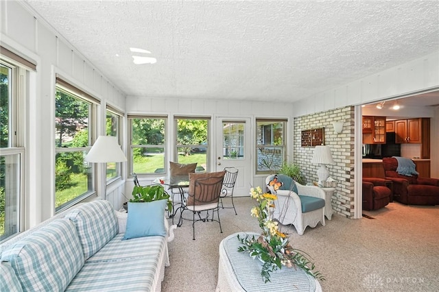 328 Shadywood Dr, Clayton, OH 45415 - sunroom with a textured ceiling and carpet floors