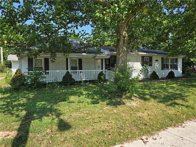1119 N Maple St, Eaton, OH 45320 - ranch-style home featuring a front yard and a porch