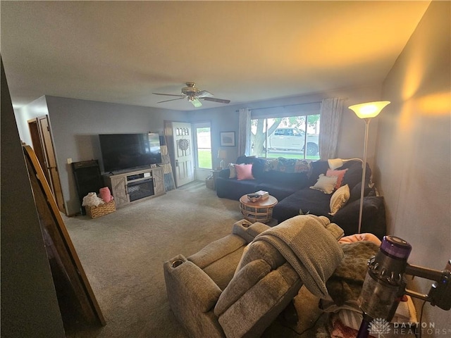 103 N Taylor St Unit 101, Farmersville, OH 45325 - carpeted living room featuring a ceiling fan and a fireplace