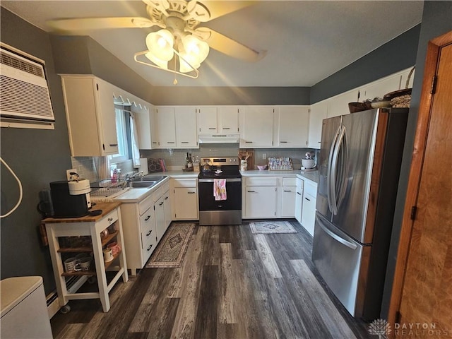103 N Taylor St Unit 101, Farmersville, OH 45325 - kitchen with stainless steel appliances, under cabinet range hood, dark wood-style floors, a ceiling fan, and light countertops