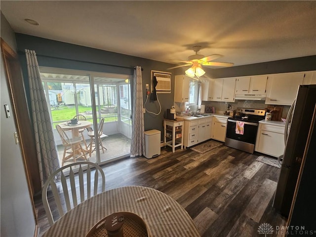 103 N Taylor St Unit 101, Farmersville, OH 45325 - kitchen featuring stainless steel appliances, ceiling fan, light countertops, dark wood-style floors, and white cabinetry