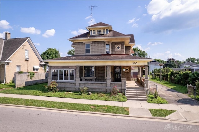 307 E Cherry St, New Paris, OH 45347 - american foursquare style home with a porch and a shingled roof