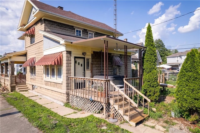 307 E Cherry St, New Paris, OH 45347 - view of front of home featuring covered porch and roof with shingles