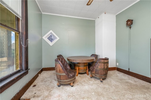 307 E Cherry St, New Paris, OH 45347 - dining room featuring crown molding, carpet, and a ceiling fan
