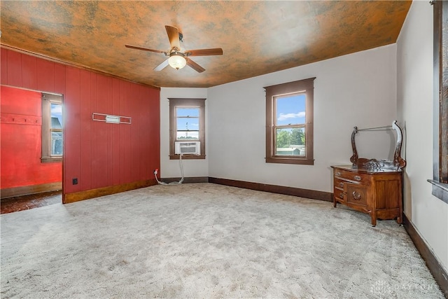307 E Cherry St, New Paris, OH 45347 - spare room featuring a ceiling fan, carpet floors, and cooling unit