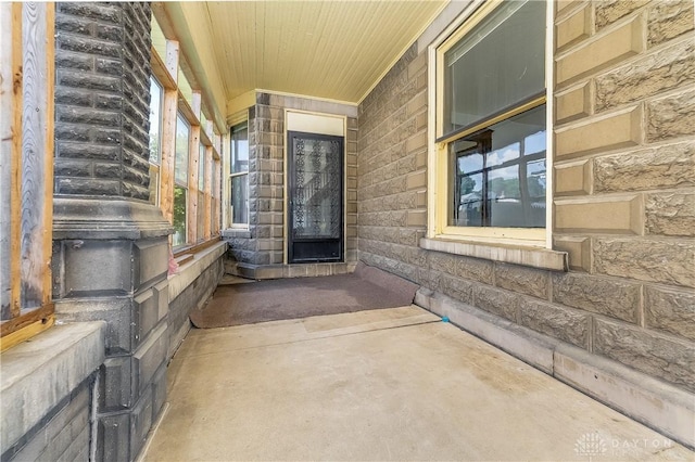 307 E Cherry St, New Paris, OH 45347 - doorway to property featuring stone siding