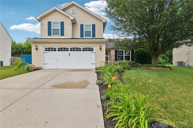 4307 Dobbin Cir, Dayton, OH 45424 - traditional home with an attached garage, a front yard, and driveway