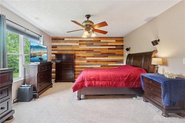 4307 Dobbin Cir, Dayton, OH 45424 - bedroom featuring wood walls, carpet flooring, and ceiling fan