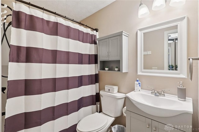 4307 Dobbin Cir, Dayton, OH 45424 - bathroom featuring a textured ceiling, vanity, and a shower with shower curtain