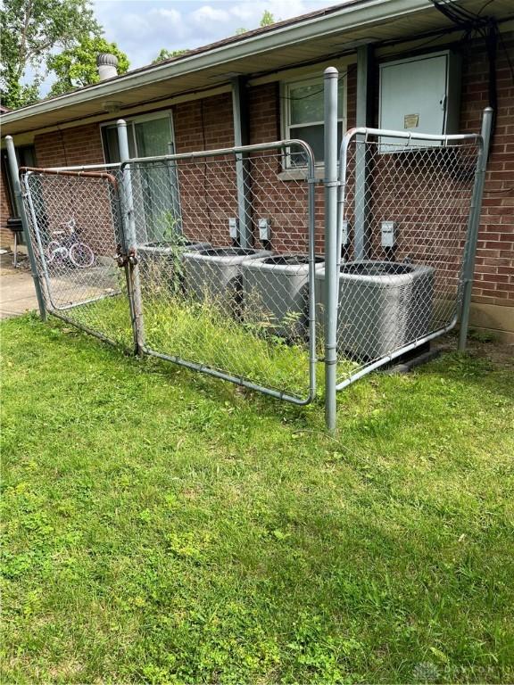 4051 Crest Dr, Dayton, OH 45416 - view of side of property with brick siding