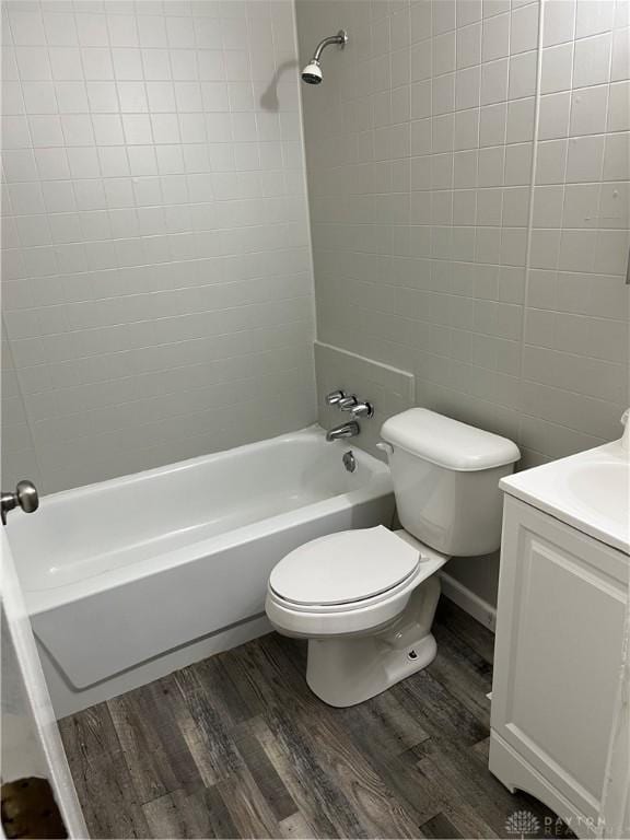 4051 Crest Dr, Dayton, OH 45416 - full bathroom featuring wood finished floors, shower / tub combination, and vanity