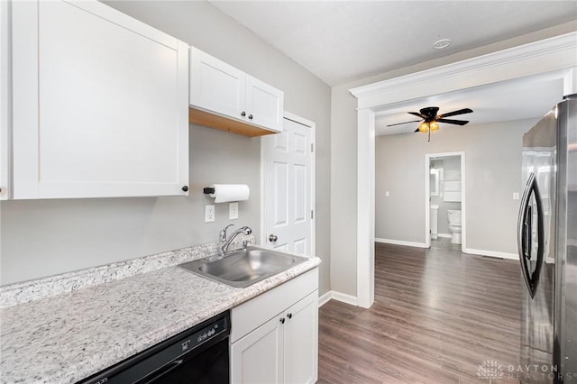 2215 Pearl St, Middletown, OH 45044 - kitchen featuring freestanding refrigerator, dishwasher, white cabinetry, wood finished floors, and a ceiling fan