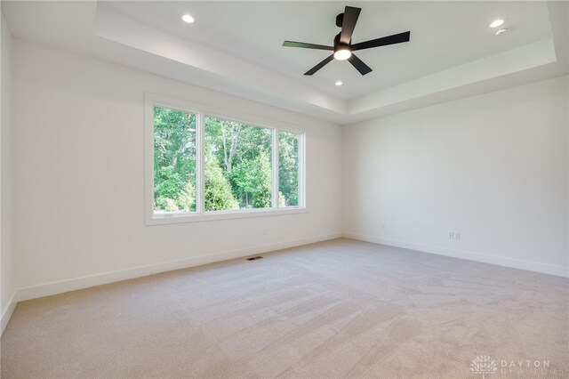 9508 Magnolia Ct, Washington Twp, OH 45458 - unfurnished room with a raised ceiling, recessed lighting, light colored carpet, and a ceiling fan