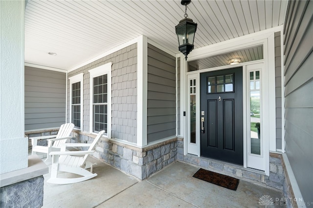 7949 Bending Willow Ct, Clearcreek Twp, OH 45068 - property entrance with covered porch and stone siding