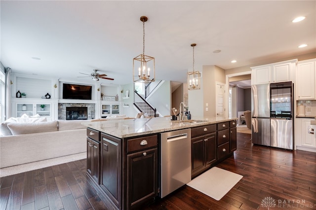 7949 Bending Willow Ct, Clearcreek Twp, OH 45068 - kitchen featuring stainless steel appliances, a ceiling fan, white cabinetry, dark wood finished floors, and recessed lighting