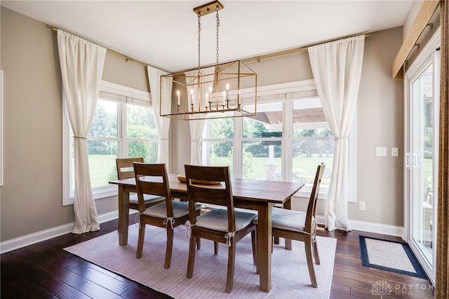 7949 Bending Willow Ct, Clearcreek Twp, OH 45068 - dining area featuring a chandelier and dark wood-type flooring