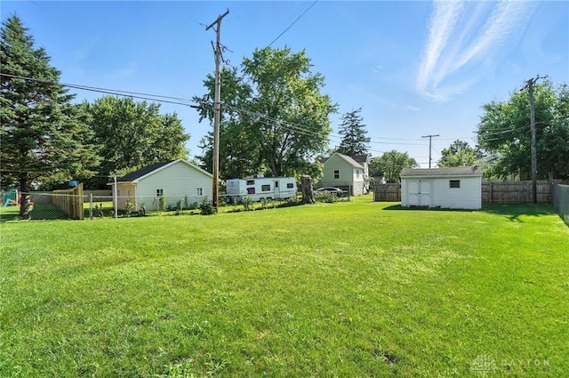 634 S Main, West Milton, OH 45383 - fenced backyard featuring a storage shed