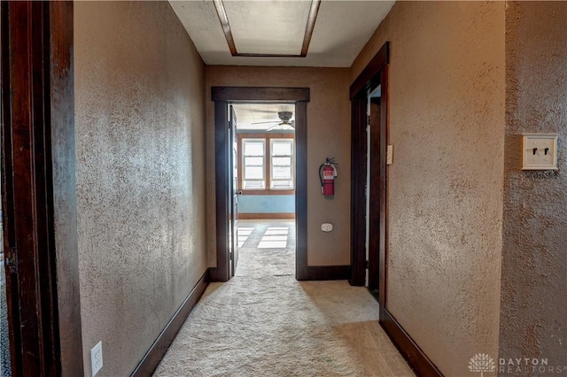 513 S High St, Arcanum, OH 45304 - corridor featuring a textured wall and light carpet