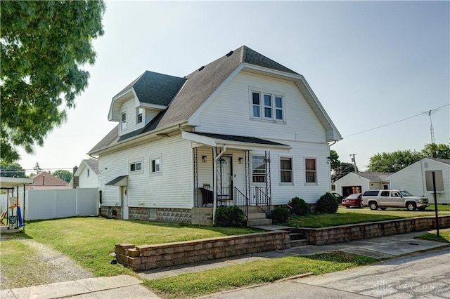513 S High St, Arcanum, OH 45304 - colonial inspired home featuring roof with shingles