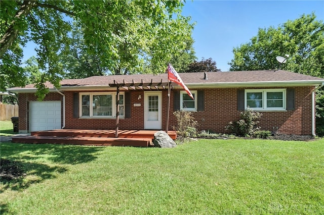 4513 Hannah Dr, Middletown, OH 45044 - ranch-style house featuring an attached garage, brick siding, a pergola, and a wooden deck