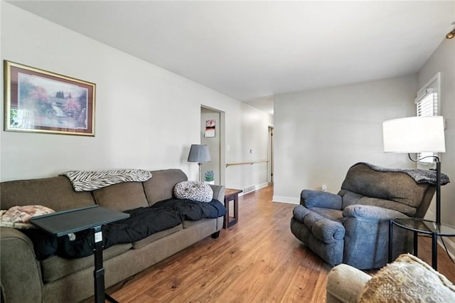 4513 Hannah Dr, Middletown, OH 45044 - living area featuring light wood-style floors and baseboards