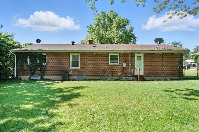 4513 Hannah Dr, Middletown, OH 45044 - rear view of house featuring entry steps and brick siding
