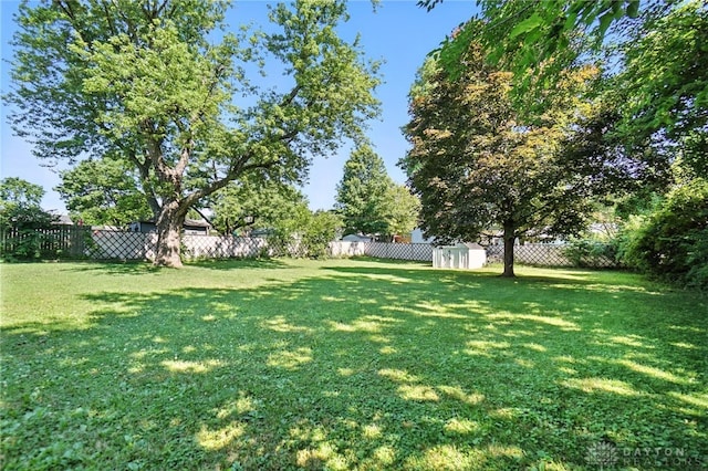 4513 Hannah Dr, Middletown, OH 45044 - fenced backyard featuring a storage shed