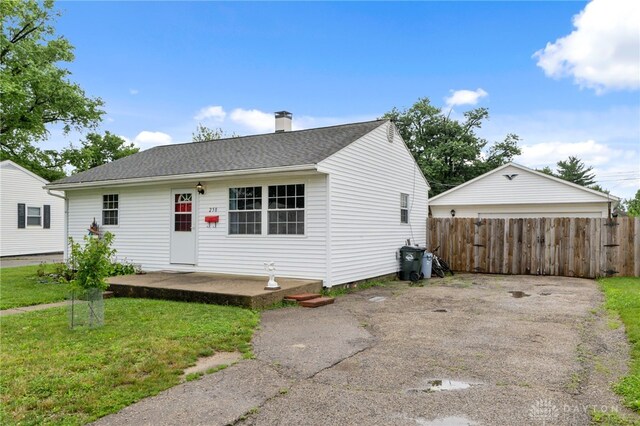 250 Pat Ln, Fairborn, OH 45324 - view of front facade featuring a chimney and roof with shingles