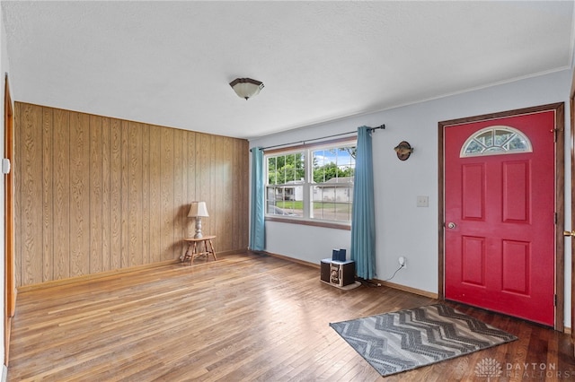 250 Pat Ln, Fairborn, OH 45324 - foyer entrance with wood walls and hardwood / wood-style floors