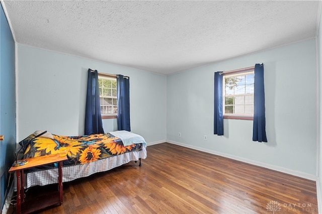 250 Pat Ln, Fairborn, OH 45324 - bedroom featuring hardwood / wood-style flooring and a textured ceiling