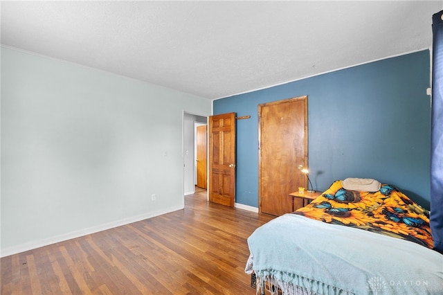 250 Pat Ln, Fairborn, OH 45324 - bedroom with baseboards and wood finished floors