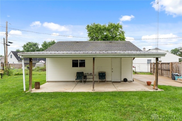 250 Pat Ln, Fairborn, OH 45324 - rear view of house with a patio and a metal roof