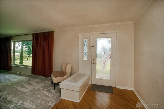5975 Oakridge Dr, Hamilton, OH 45011 - entrance foyer featuring wood finished floors and ornamental molding