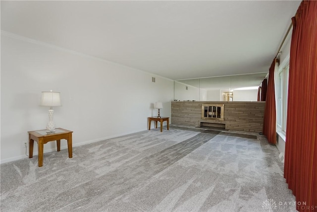 5975 Oakridge Dr, Hamilton, OH 45011 - unfurnished living room with carpet and crown molding