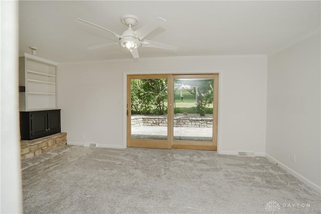 5975 Oakridge Dr, Hamilton, OH 45011 - unfurnished living room with carpet flooring, ornamental molding, and a ceiling fan