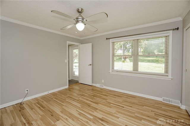 5975 Oakridge Dr, Hamilton, OH 45011 - empty room featuring light wood-style flooring, a ceiling fan, and crown molding