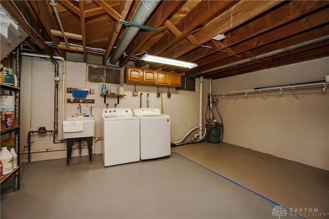 5975 Oakridge Dr, Hamilton, OH 45011 - unfinished basement with independent washer and dryer and a sink