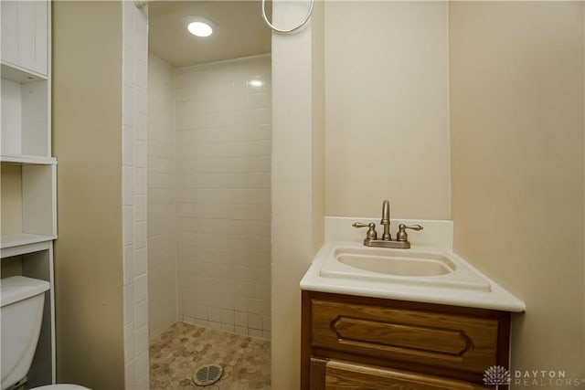 5975 Oakridge Dr, Hamilton, OH 45011 - full bathroom with vanity and a tile shower