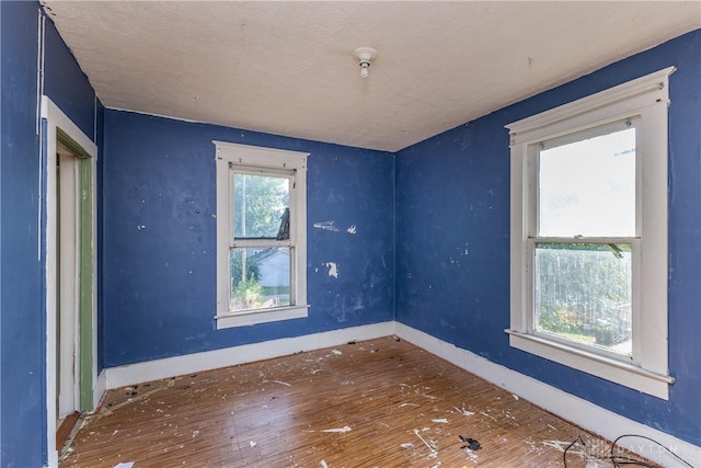 2005 Queen Ave, Middletown, OH 45044 - unfurnished room with wood-type flooring and baseboards