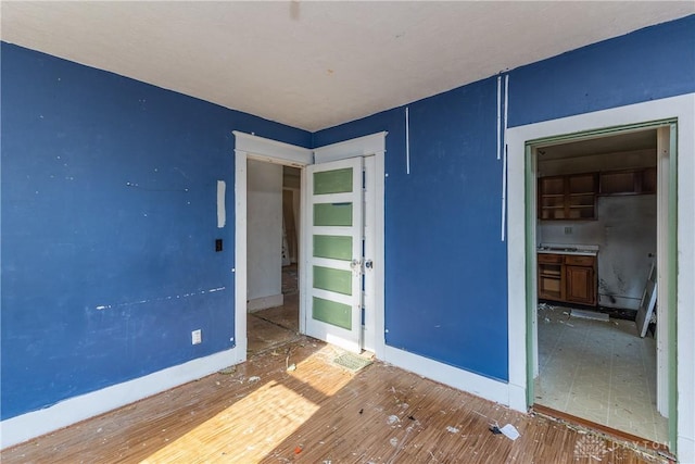 2005 Queen Ave, Middletown, OH 45044 - unfurnished room with baseboards and wood finished floors