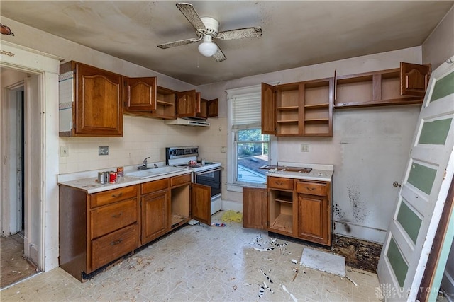 2005 Queen Ave, Middletown, OH 45044 - kitchen featuring open shelves, white range with electric stovetop, under cabinet range hood, a ceiling fan, and light countertops