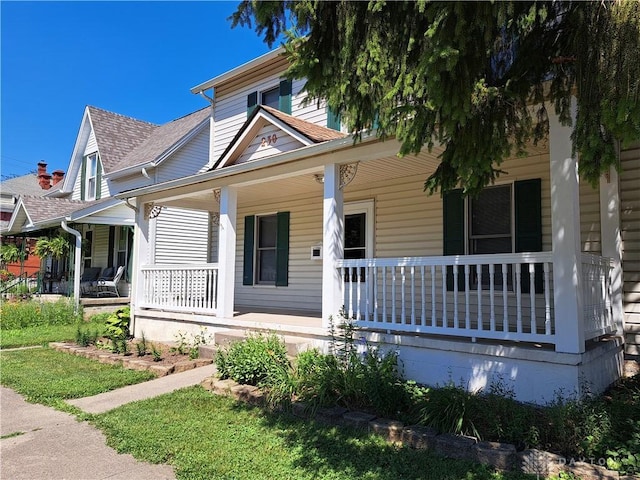 230 S 5th St, Miamisburg, OH 45342 - view of front of home featuring covered porch and a shingled roof