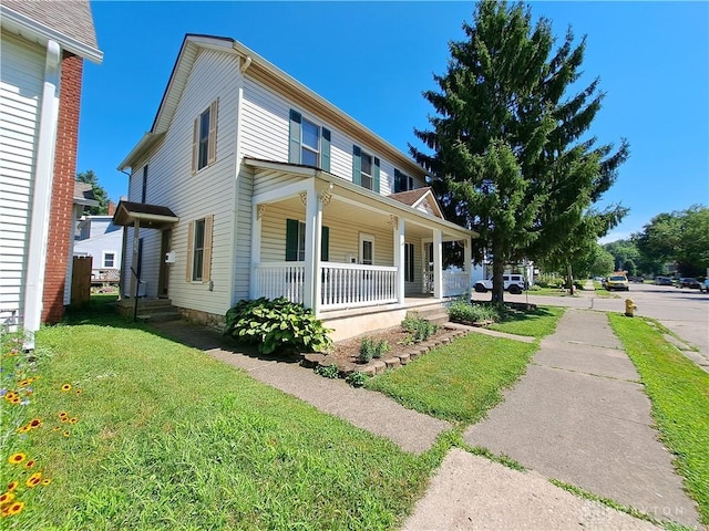 230 S 5th St, Miamisburg, OH 45342 - view of front facade featuring a porch and a front lawn
