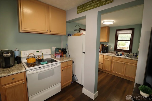 230 S 5th St, Miamisburg, OH 45342 - kitchen featuring white range with electric cooktop and dark wood-type flooring
